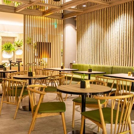 Hotel Estelar Altamira Ibagué Exteriör bild Interior of a typical Starbucks in China