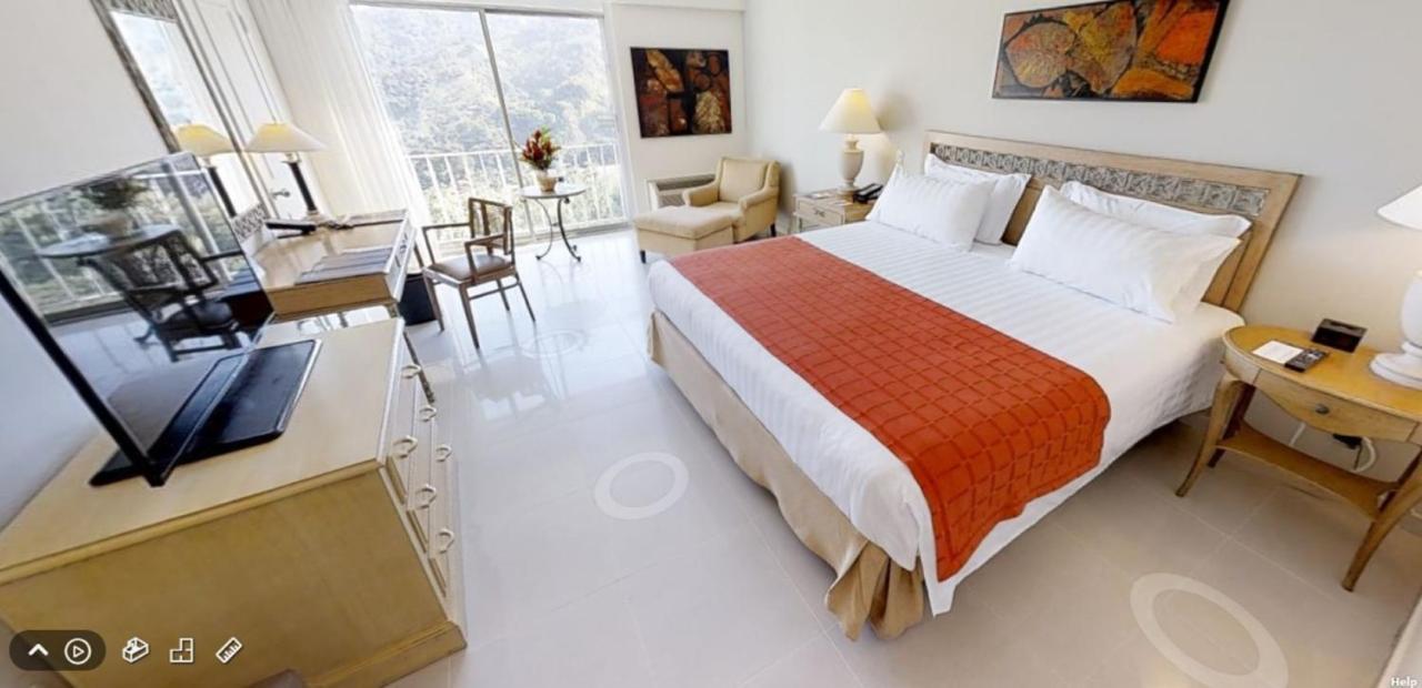 Hotel Estelar Altamira Ibagué Exteriör bild A room at the hotel