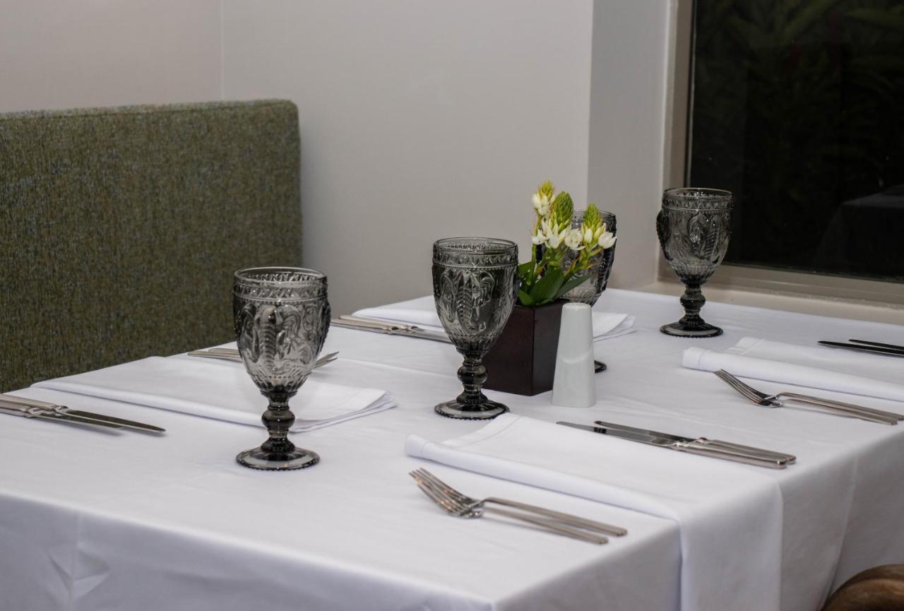 Hotel Estelar Altamira Ibagué Exteriör bild A table set for a meal